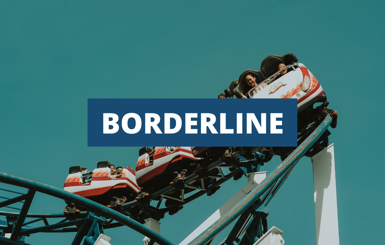 Napis: border line; w tle roller coaster